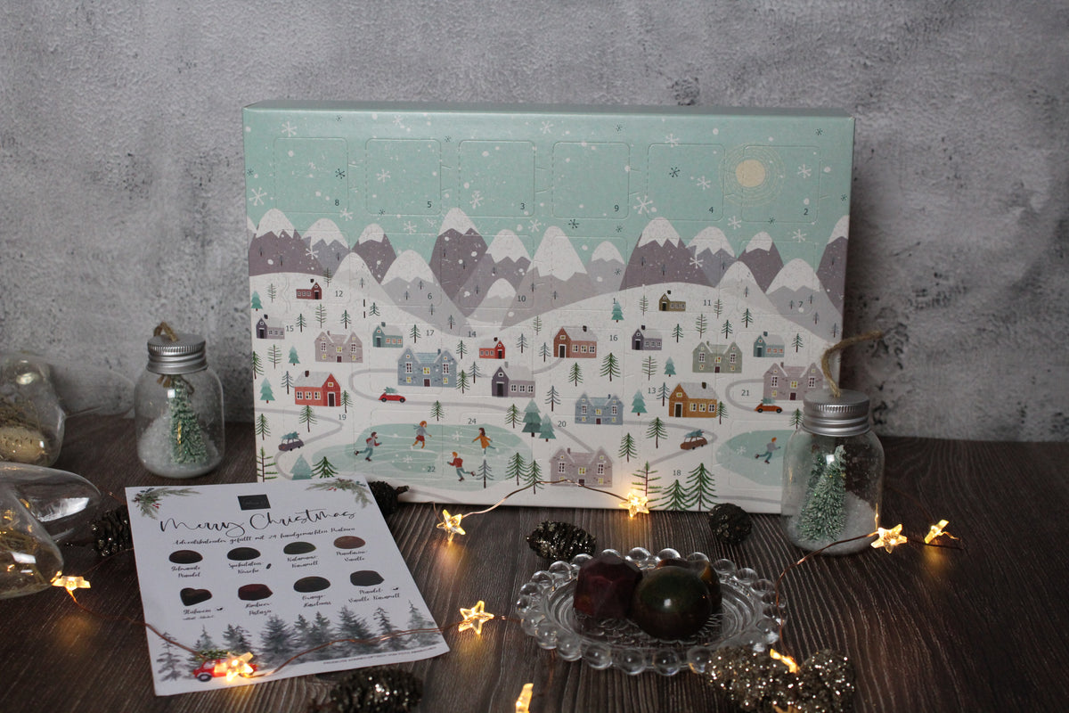 Design 2025 Winterlandschaft Pralinenadventskalender - Vorbestellung